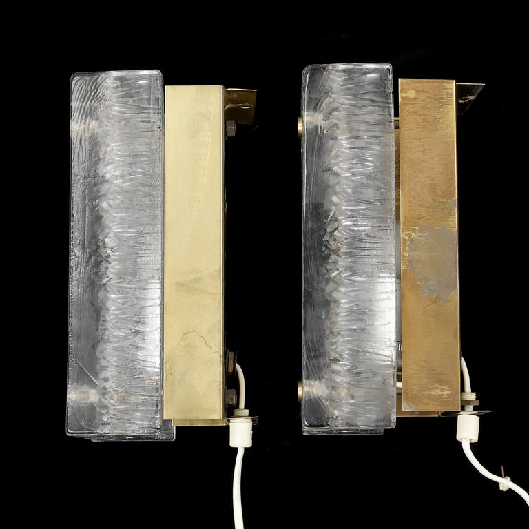 Orrefors wall light cast glass and brass a pair Sweden 1960
