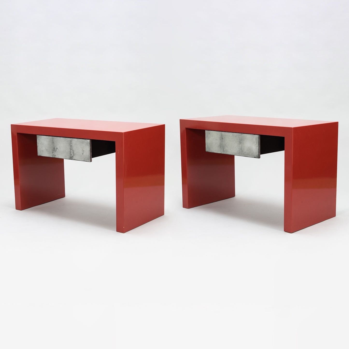 A pair of red lacquered tables by Artist Kaisa Blomstedt Sweden 1990