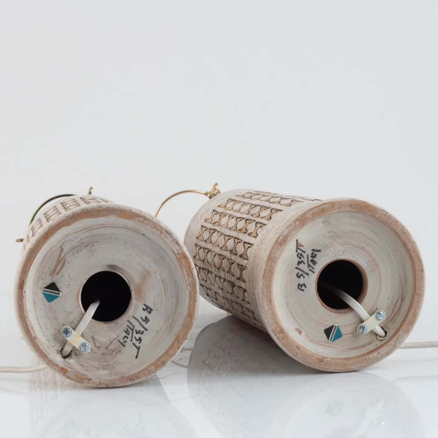 Pair of Bergboms Ivory Glazed and Gold Ceramic Table Lamps, Sweden, circa 1960
