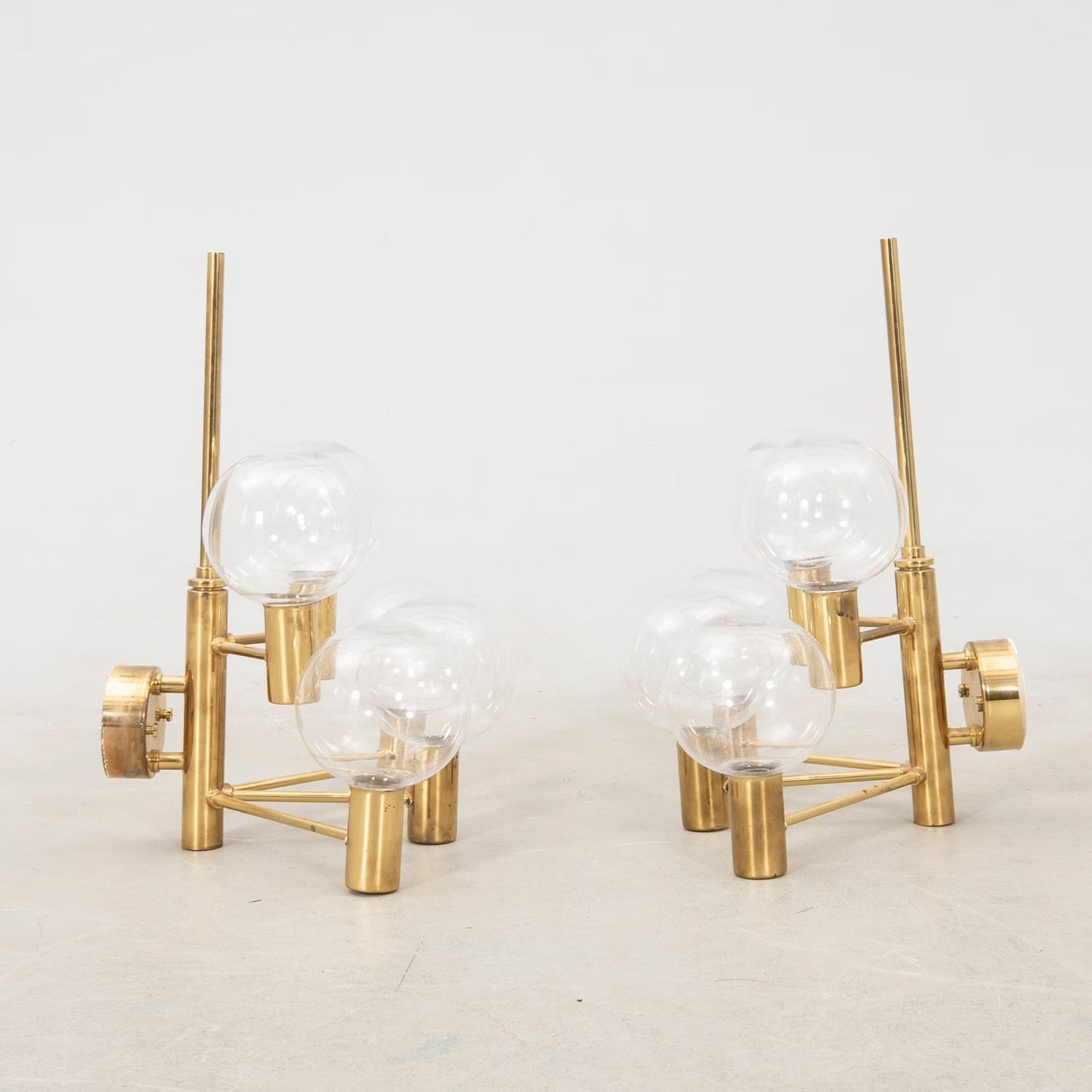 Hans-Agne Jakobsson Wall lamps clear glass and brass a pair Sweden 1960