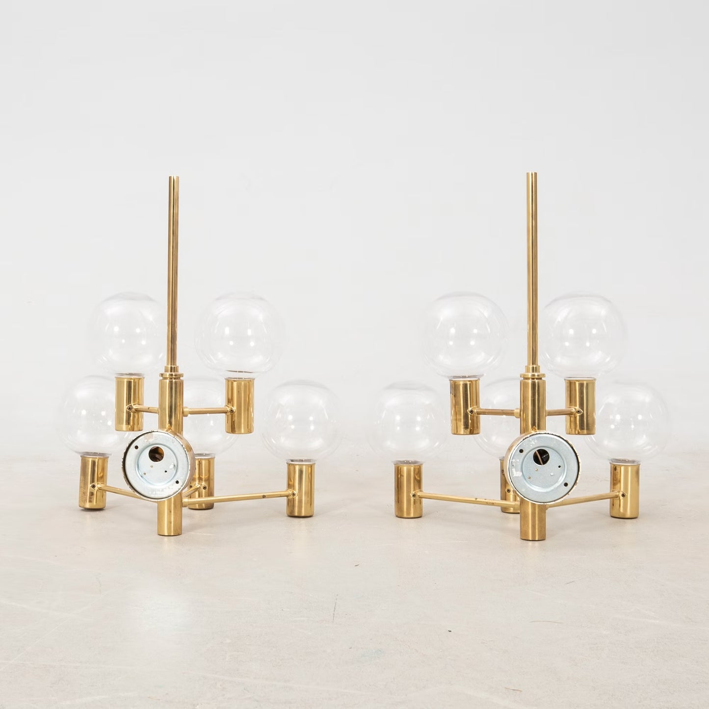 Hans-Agne Jakobsson Wall lamps clear glass and brass a pair Sweden 1960