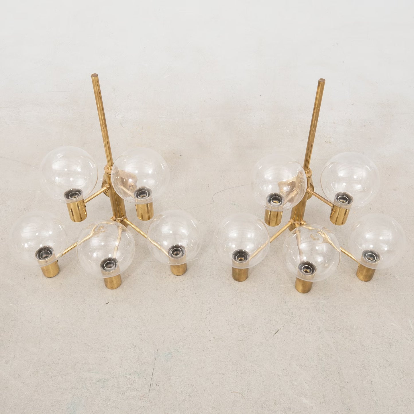 Hans-Agne Jakobsson Wall lamps clear glass and brass a pair Sweden 1960
