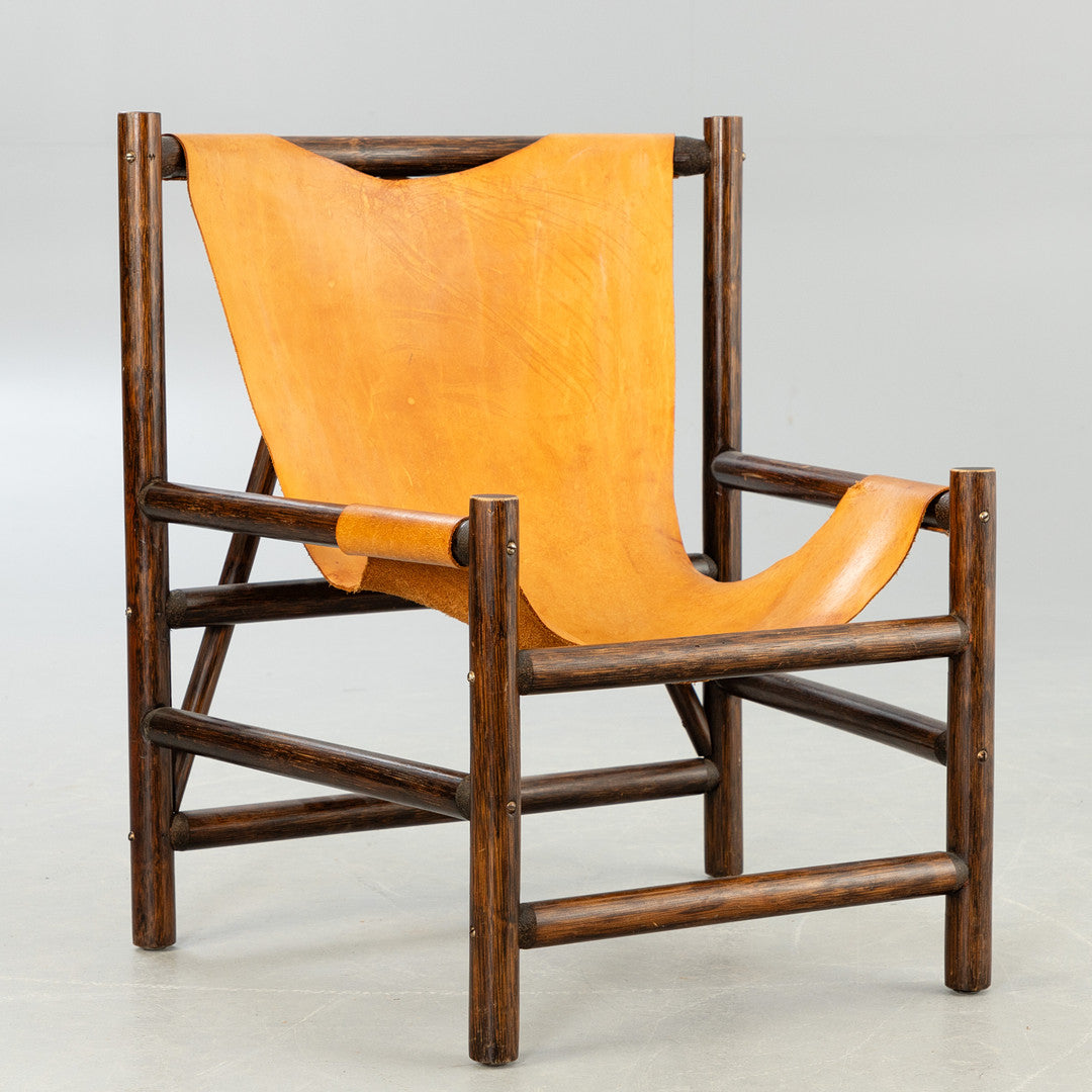 Carl Axel Acking style armchair wood and leather Sweden 1960