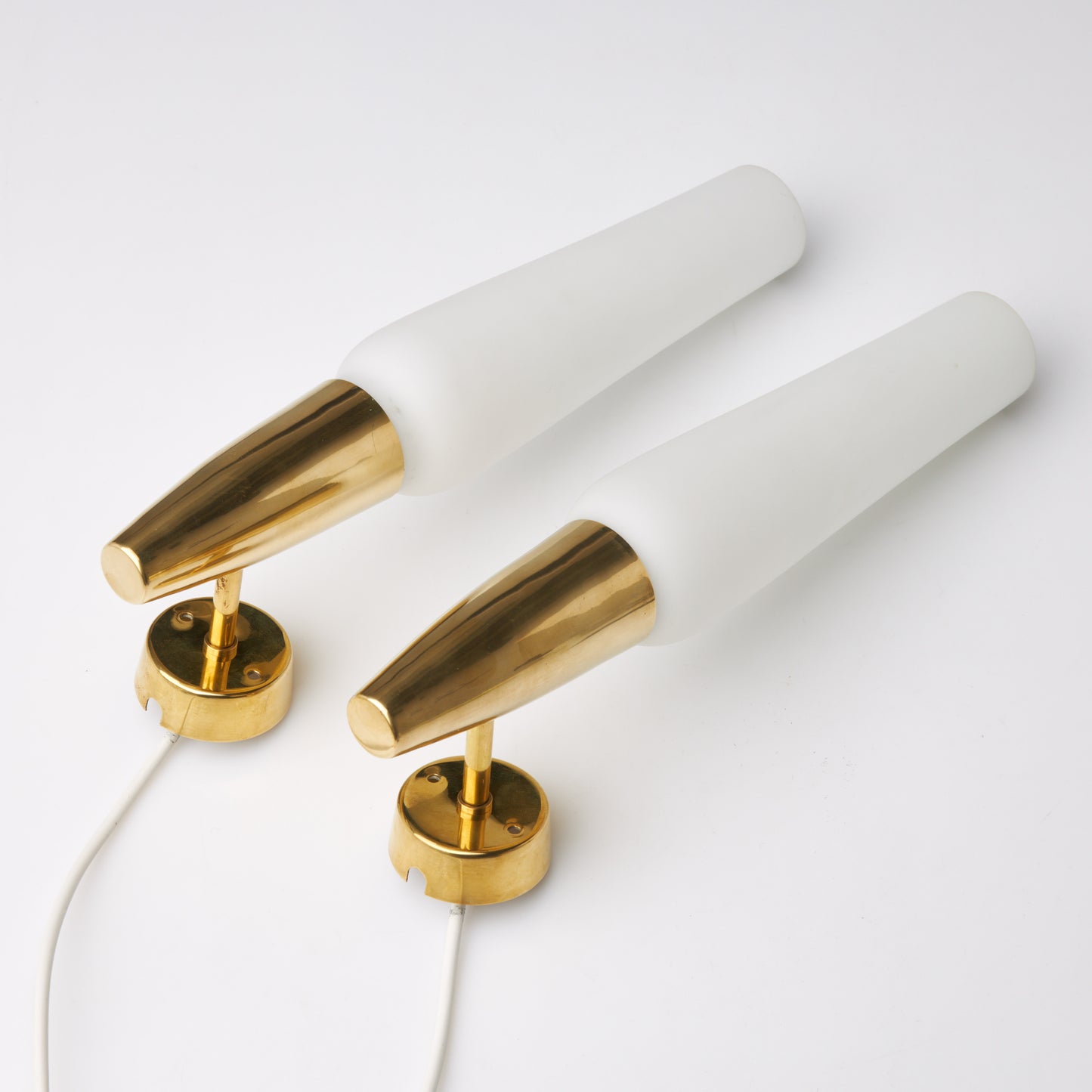 Asea wall lights a pair in brass and glass Sweden 1960