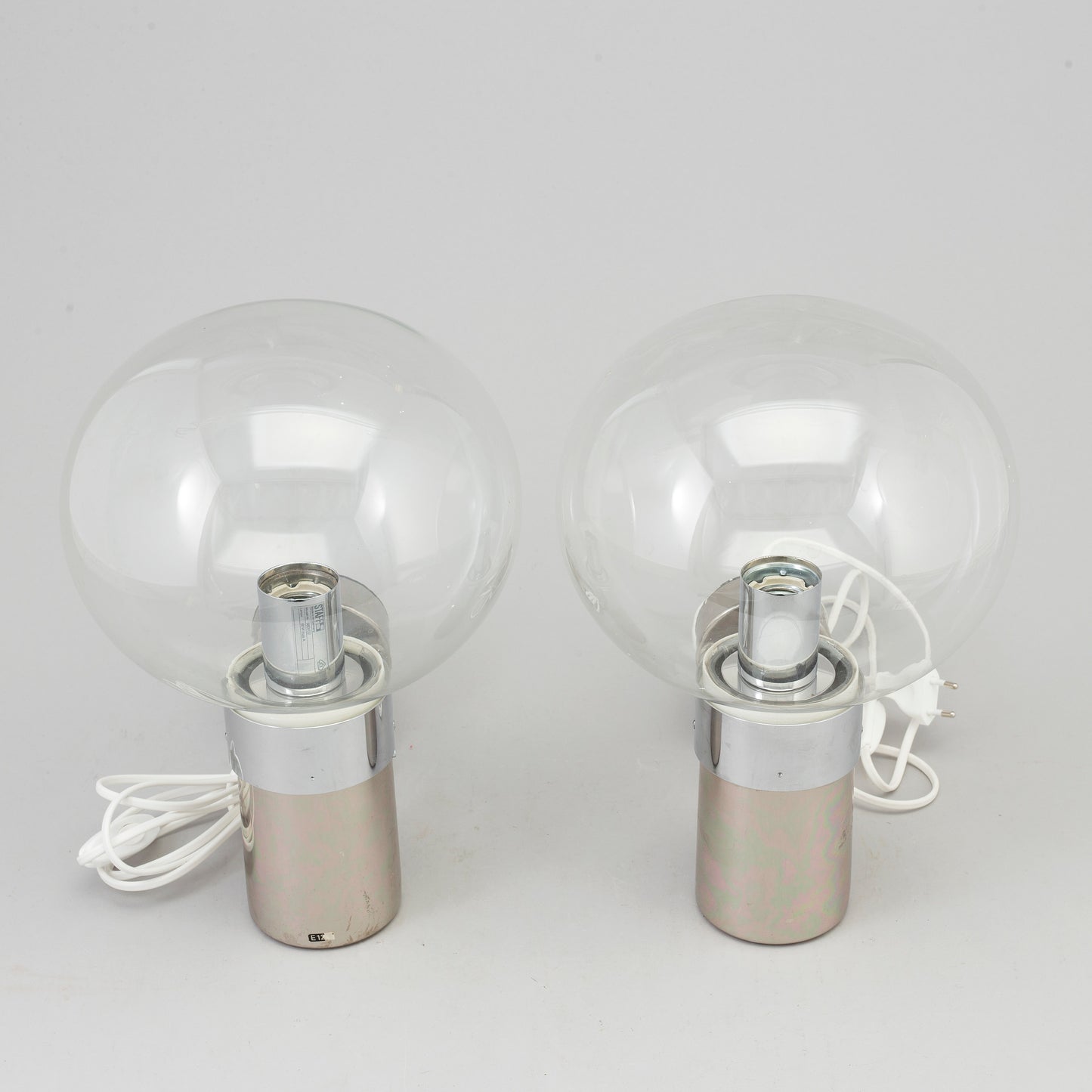 A pair of wall lamps by STEFF Chrome and Glass Germany c. 1980