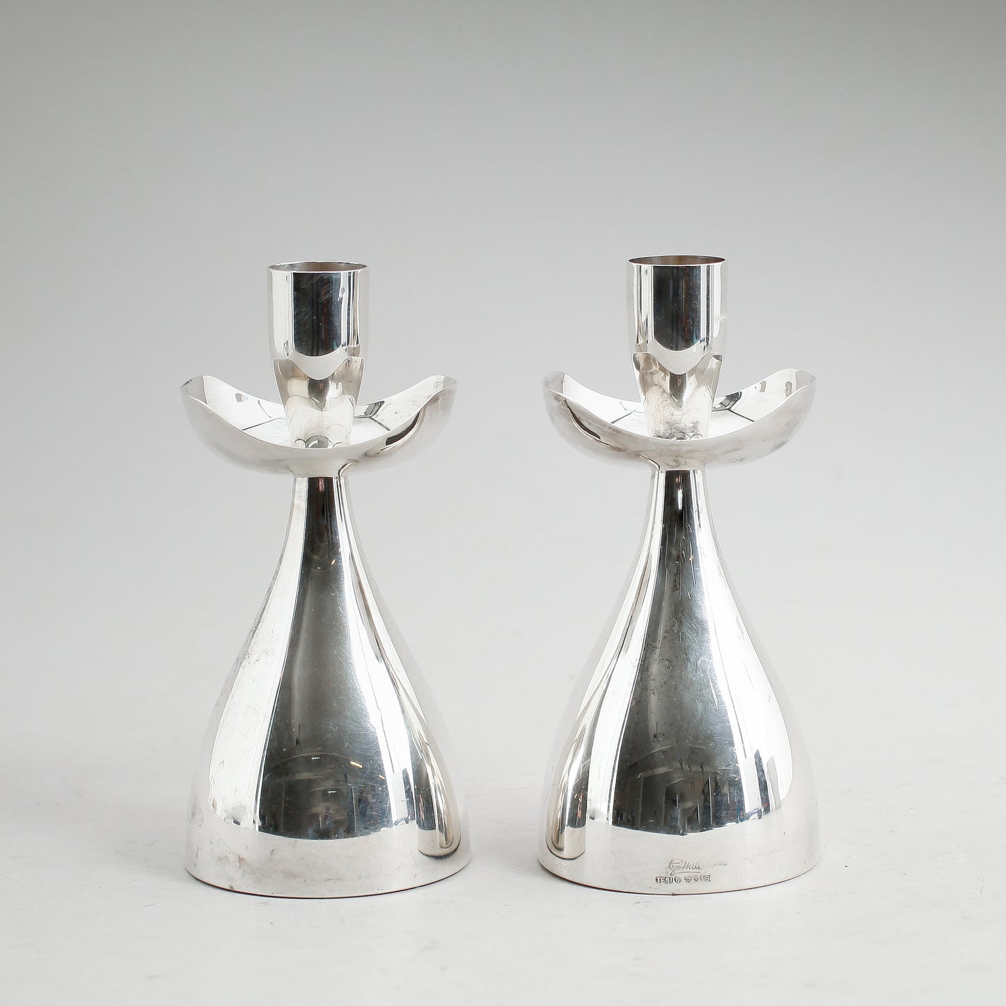 A pair of Silver candle Holder by GosthlinSweden 1960. Signed