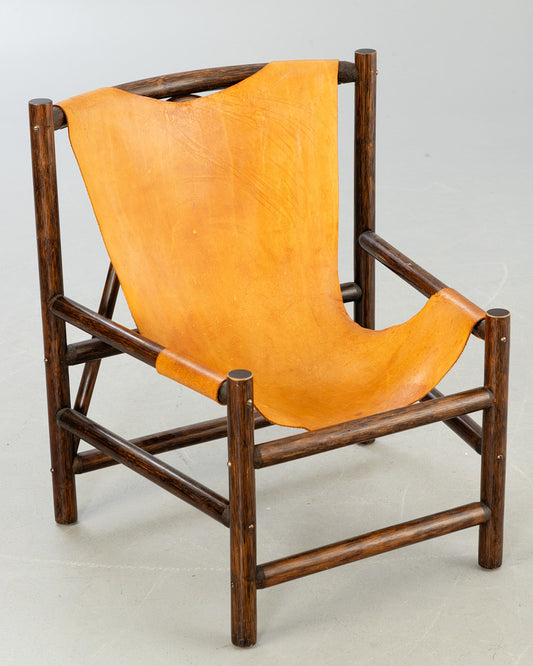 Carl Axel Acking style armchair wood and leather Sweden 1960