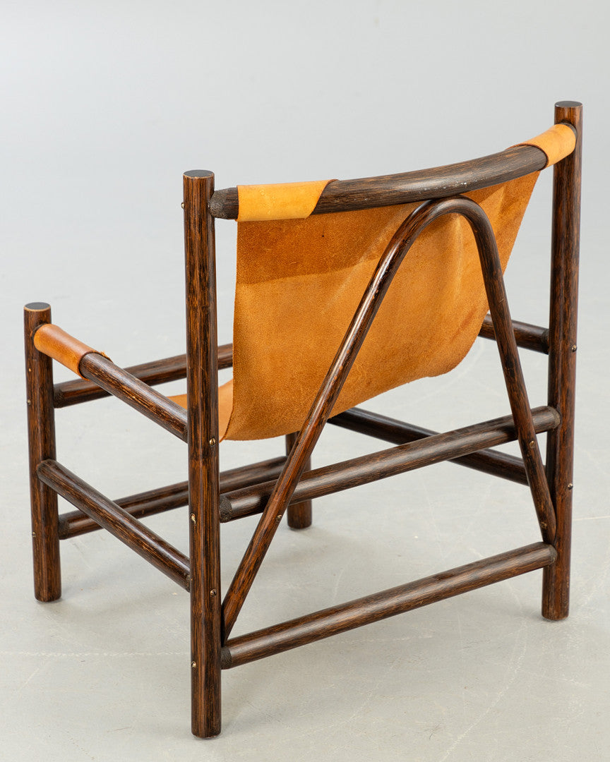 Carl Axel Acking style armchair wood and leather Sweden 1960