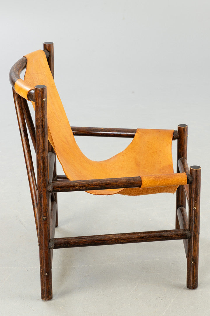 Carl Axel Acking style armchair wood and leather Sweden 1960