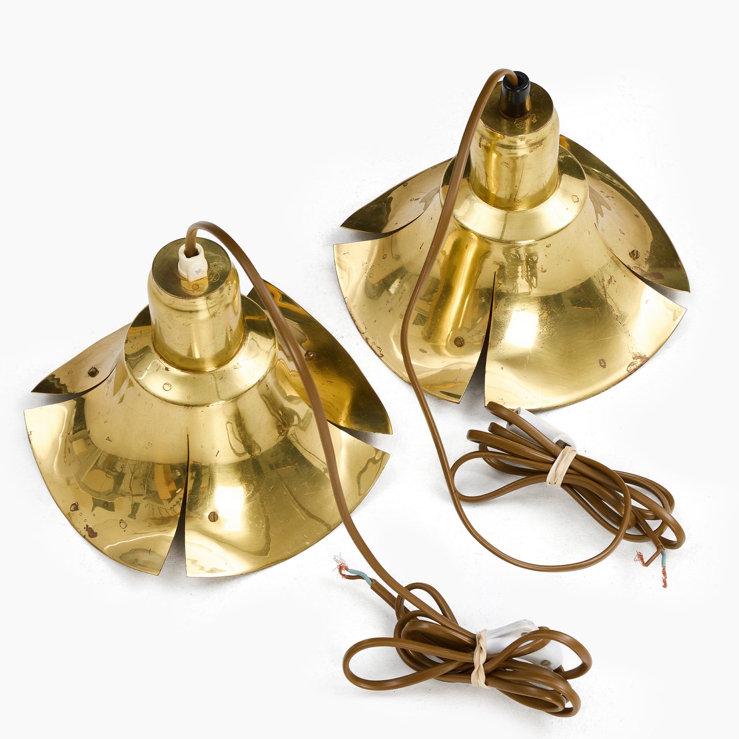 LARS HOLMSTRÖM A pair of brass ceiling lamps stamped Sweden 1960s
