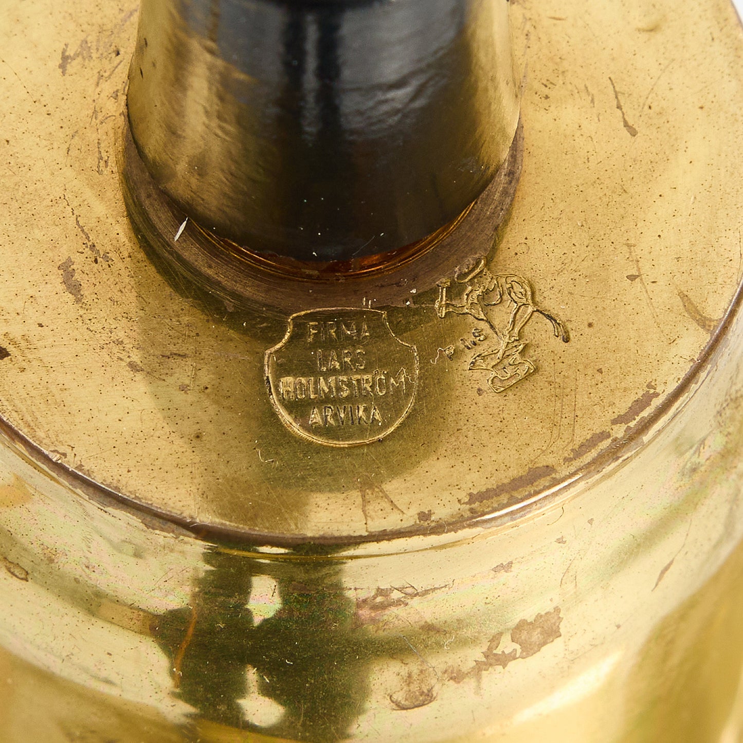 LARS HOLMSTRÖM A pair of brass ceiling lamps stamped Sweden 1960s