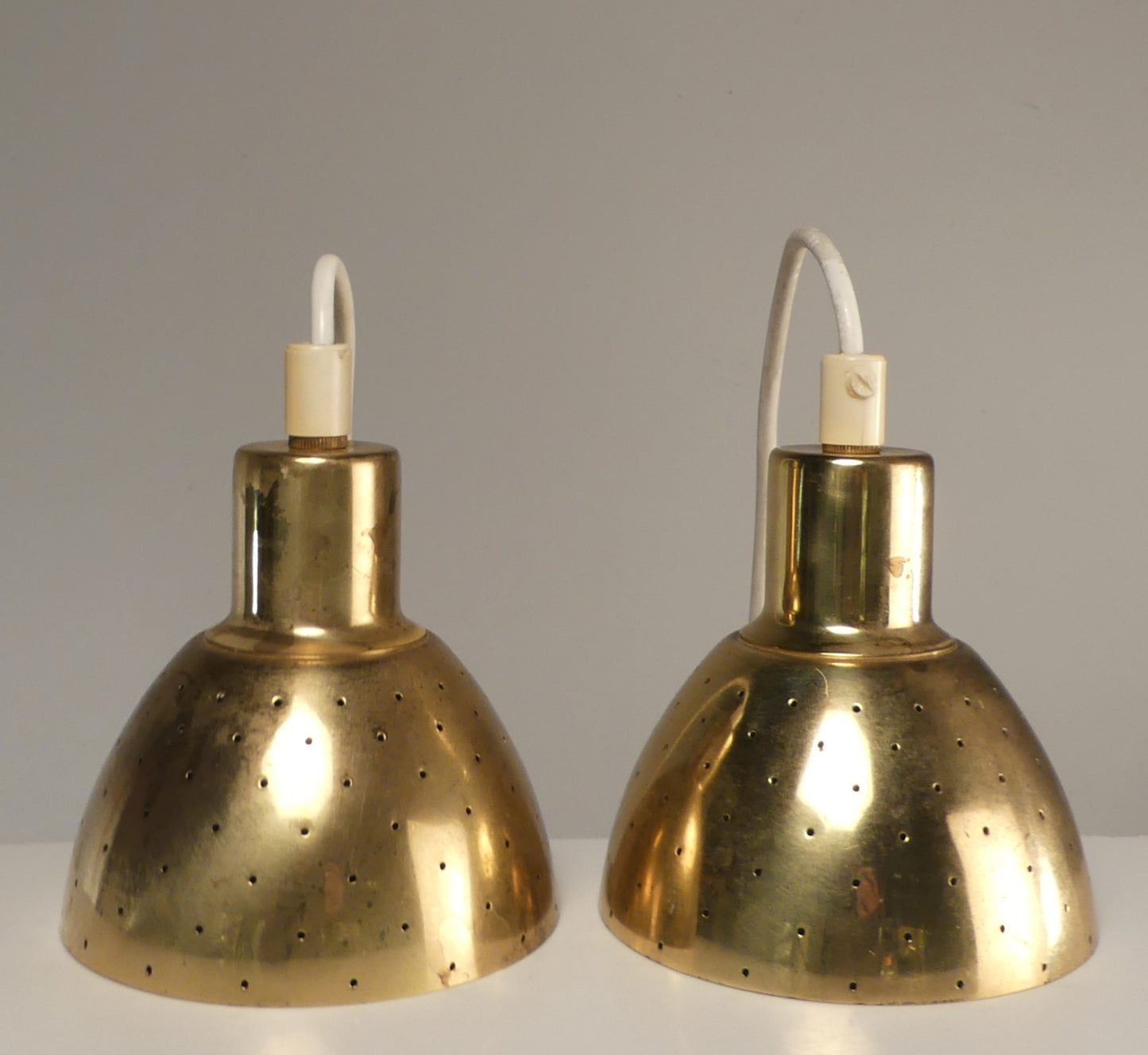 Hans-Agne Jakobsson Perforated Brass Pendants for Markaryd 1960
